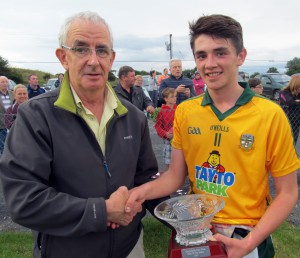 Presentation of the Millbrook Food Market 'Man of the match' award to Conal Ahearne by Eddie O'Reilly